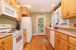 Galley style kitchen with everything you need for quick meal at home